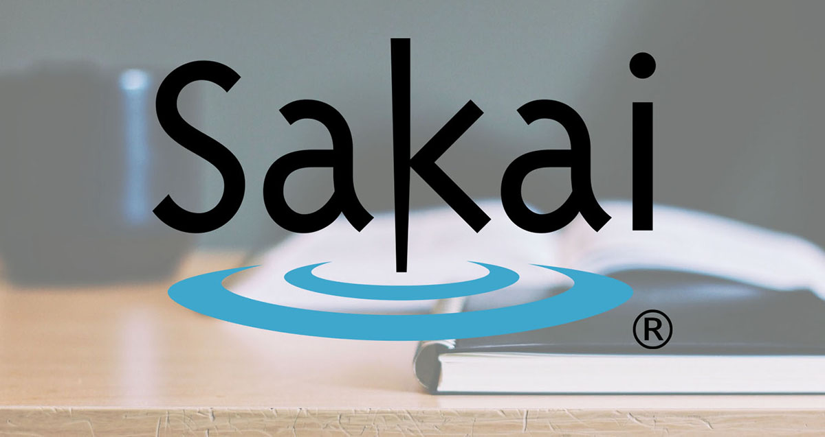 sakai logo and books on desk