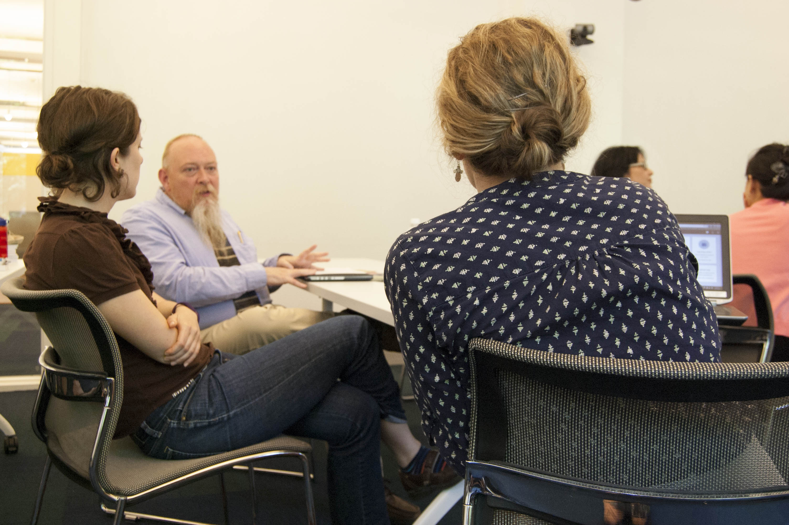 Randy Riddle consults with faculty