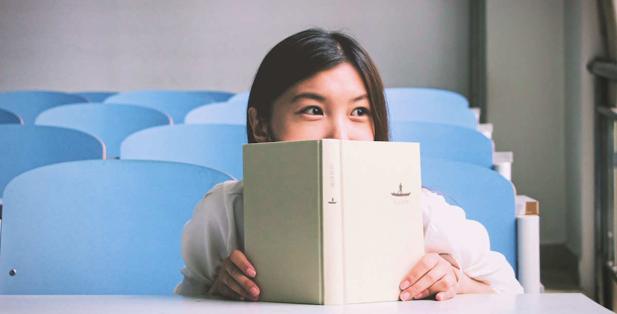 student with book