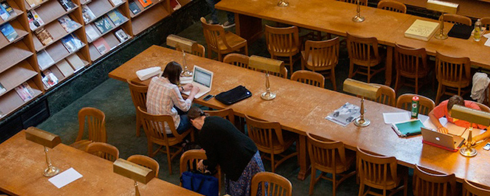 student working in library