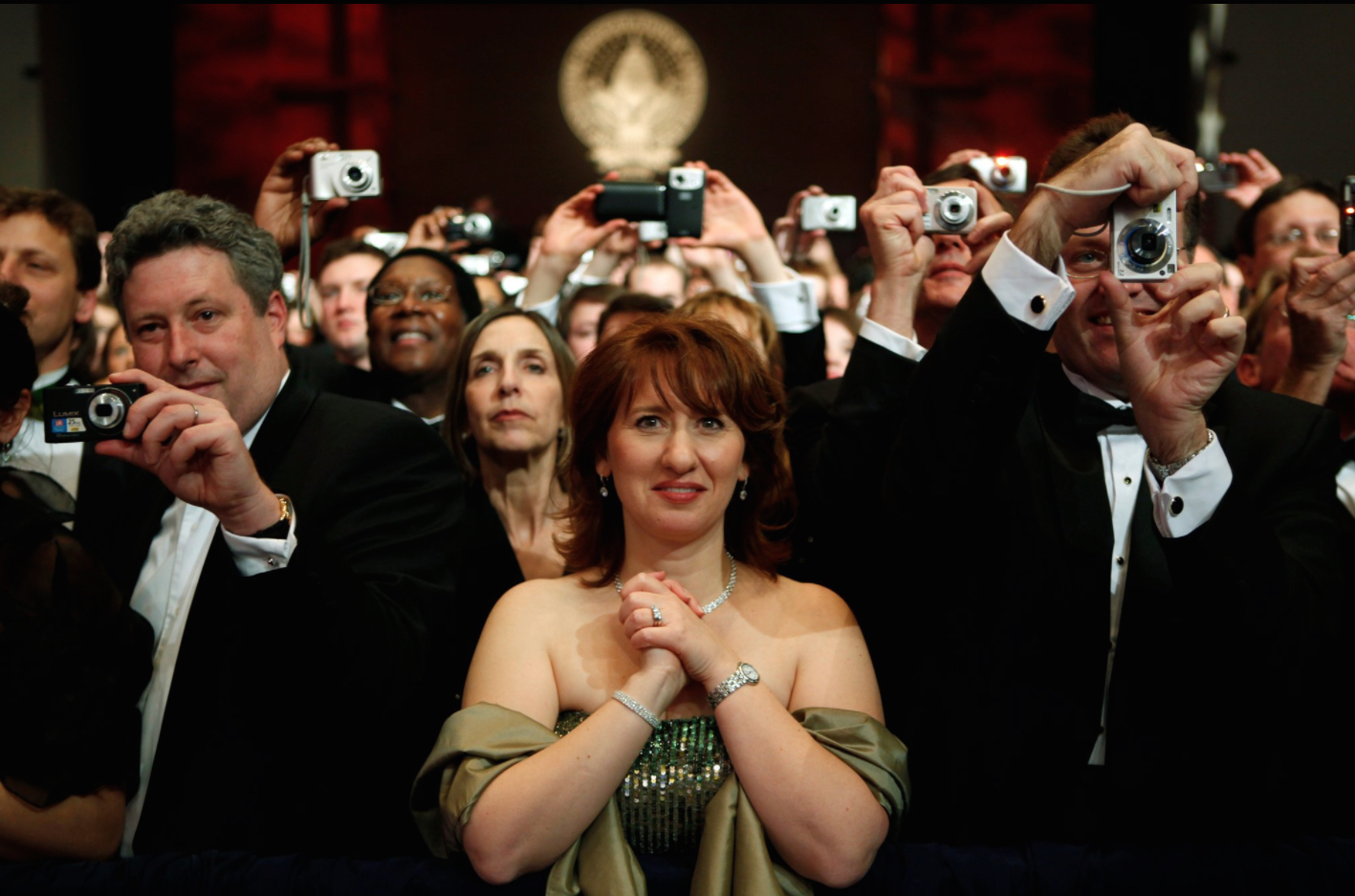 "What's Going on in This Picture?" featured NY Times image of woman surrounded by a crowd with cameras.