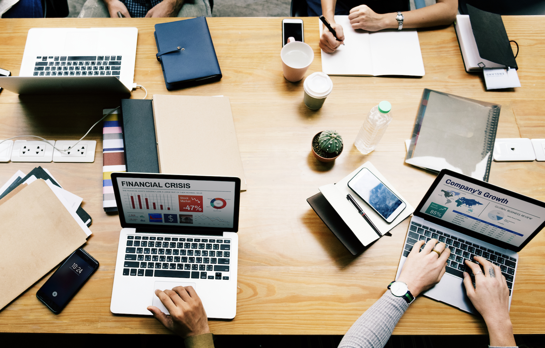 Business people working on laptops