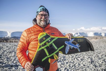 Photo of Dave Johnston holding a drone