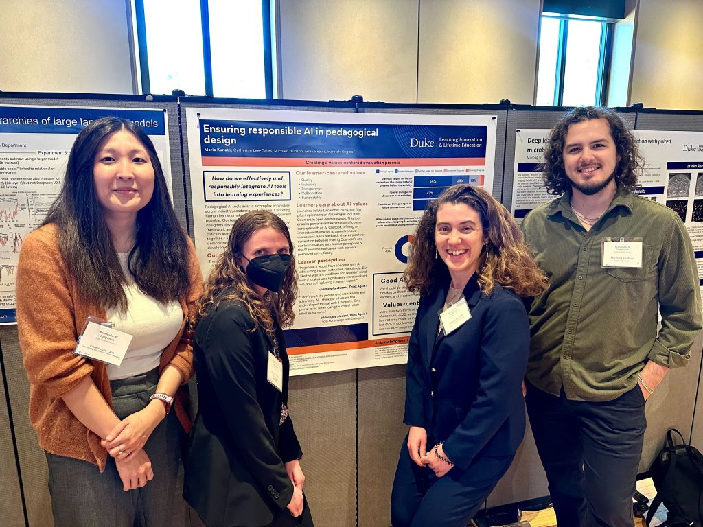 Catherine Lee-Cates, Hannah Rogers, Maria Kunath and Michael Hudson with their poster.